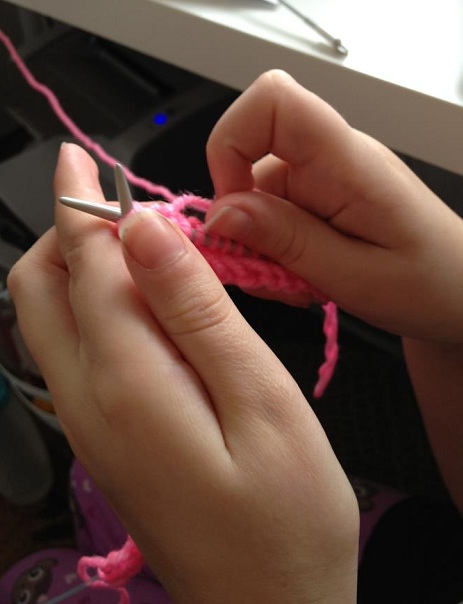 Wee One learning to knit